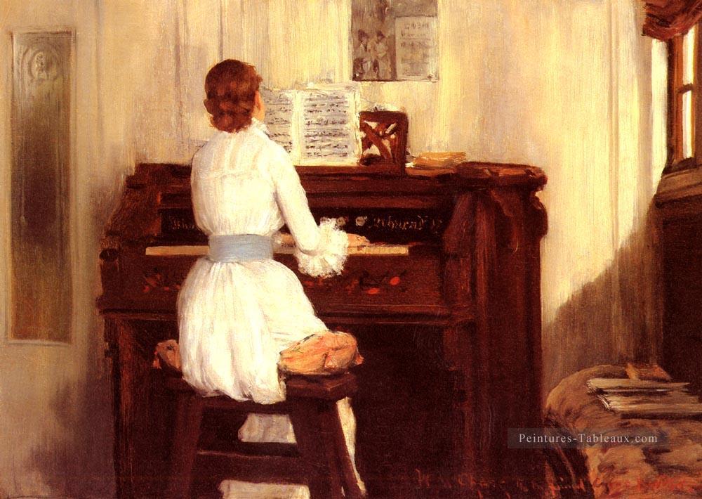 Mme Meigs à l’orgue de piano William Merritt Chase Peintures à l'huile